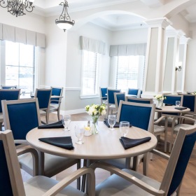 Your new home is waiting a dining room with seating and tables